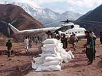 WFP Helicopter taking off after deliver food to pakistan refugee camp